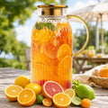 Ribbed Glass Pitcher with Gold Tone Lid and Handle